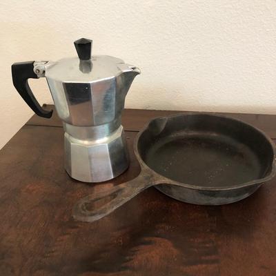 Vintage stove top espresso maker and Wagner ware cast iron pan.