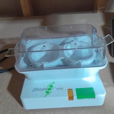 Electric All-purpose food steamer, Drink mixer, and plastic pitcher