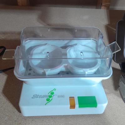 Electric All-purpose food steamer, Drink mixer, and plastic pitcher
