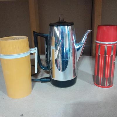 Two vintage Thermos' and a vintage General Electric Immersible brewer / perculator