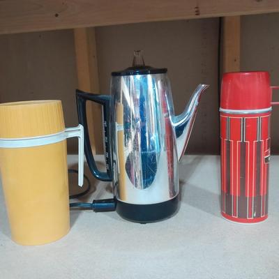 Two vintage Thermos' and a vintage General Electric Immersible brewer / perculator