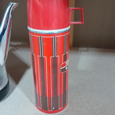 Two vintage Thermos' and a vintage General Electric Immersible brewer / perculator