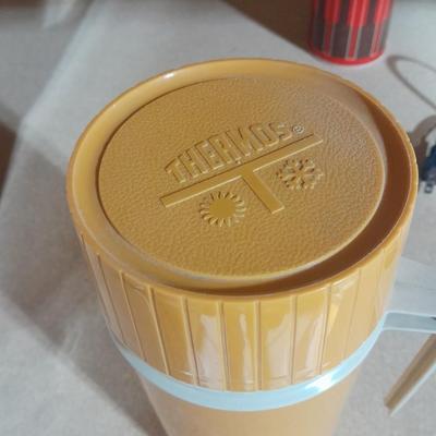 Two vintage Thermos' and a vintage General Electric Immersible brewer / perculator