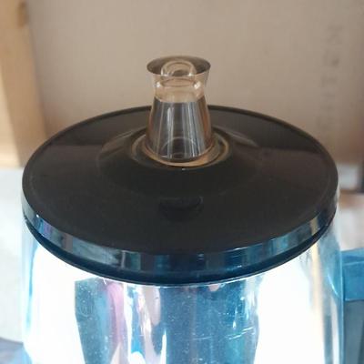 Two vintage Thermos' and a vintage General Electric Immersible brewer / perculator
