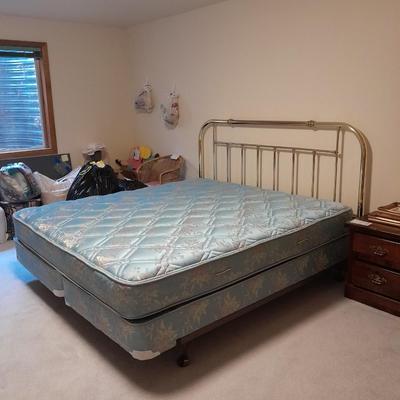 King Sized bed with Brass headboard