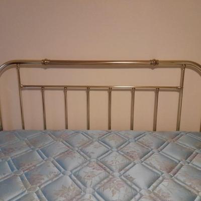 King Sized bed with Brass headboard