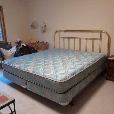 King Sized bed with Brass headboard