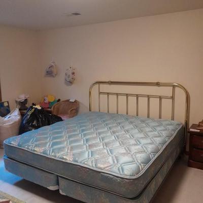 King Sized bed with Brass headboard
