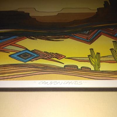 Framed Numbered and Signed "canyon lands" artwork with ceramic cactus