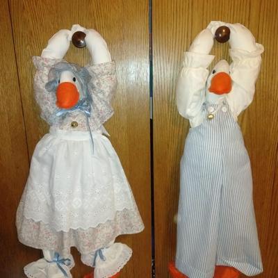 Two hand crafted doorknob hanging Geese.