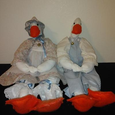Two hand crafted doorknob hanging Geese.