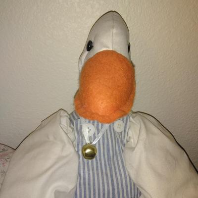 Two hand crafted doorknob hanging Geese.