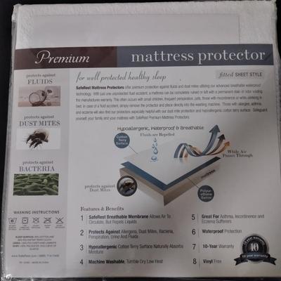 New Safe Rest Premium Mattress protector packaged marked twin sized