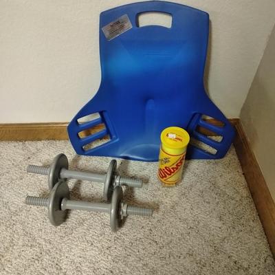 Abdomenizer, the intelligent sit-up with two 25ln weights, and a new container of tennis balls
