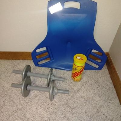 Abdomenizer, the intelligent sit-up with two 25ln weights, and a new container of tennis balls