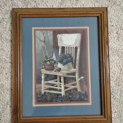 Two framed wall art pictures Country Garden cottage and an old chair in the garden