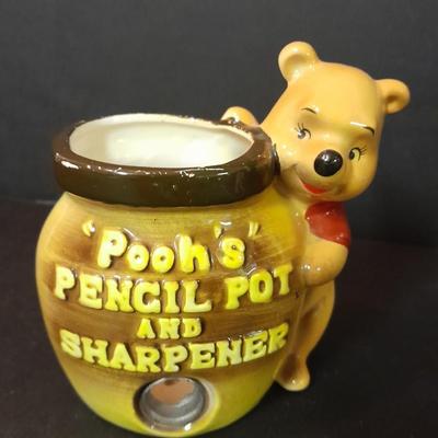 Vintage Snoopy, Pooh MCM Walt Disney productions Pencil sharpener, and Japan marked Chipmunk.