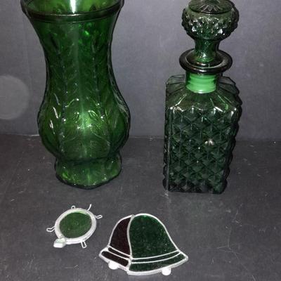 FTD Emerald Green glass vase, Italian green diamond cut decanter, and two small stained glass sun catchers