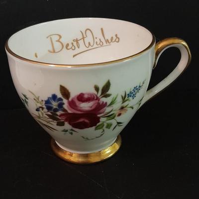 Lefton porcelain Angel, Teapot, Cup and saucer, and a silver-colored bell