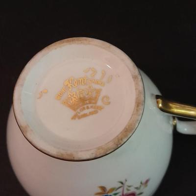 Lefton porcelain Angel, Teapot, Cup and saucer, and a silver-colored bell