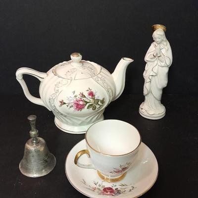 Lefton porcelain Angel, Teapot, Cup and saucer, and a silver-colored bell