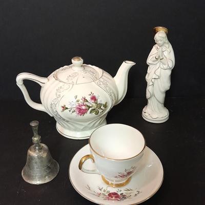 Lefton porcelain Angel, Teapot, Cup and saucer, and a silver-colored bell