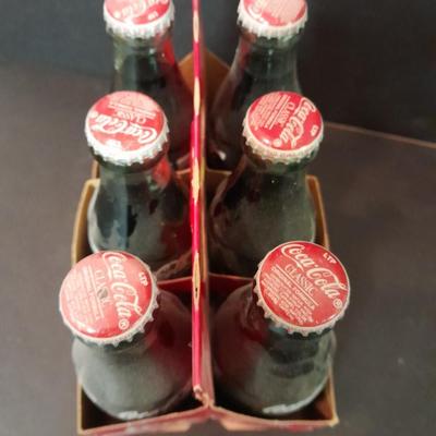 1996 Coca-Cola Classic full 6 pack bottles, and Coca-Cola lidded candy canister