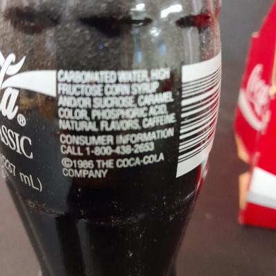 1996 Coca-Cola Classic full 6 pack bottles, and Coca-Cola lidded candy canister