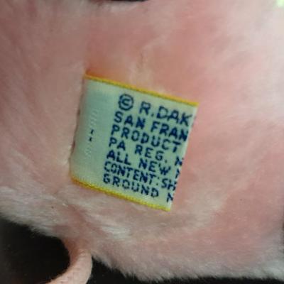 Radio Flyer wagon model and several vintage plush animals
