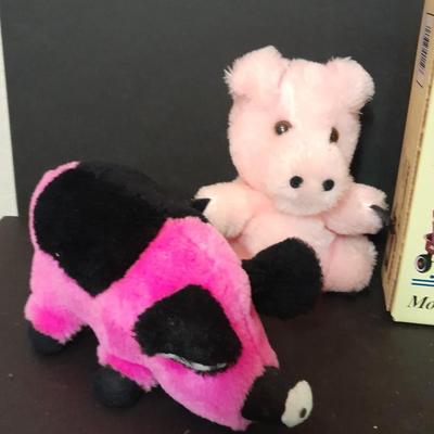 Radio Flyer wagon model and several vintage plush animals