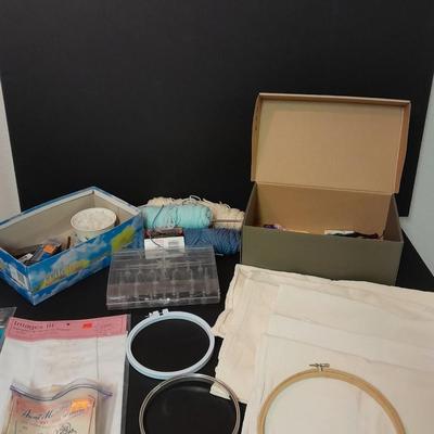 Embroidery hoops, thread, Yarn with needles, and other crafty supplies