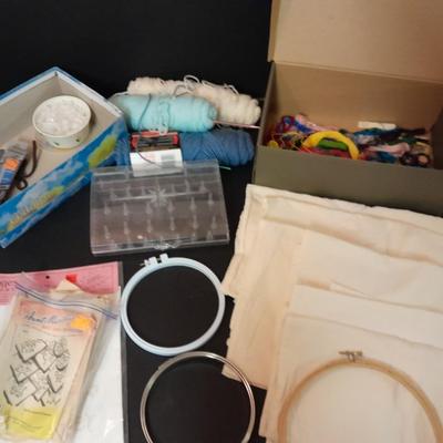 Embroidery hoops, thread, Yarn with needles, and other crafty supplies