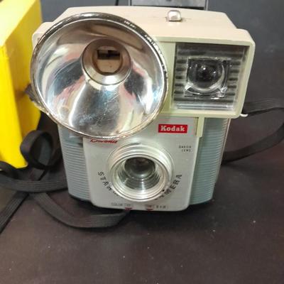 Vintage Kodak Brownie Starmite  camera and General Electric solid state AM radio