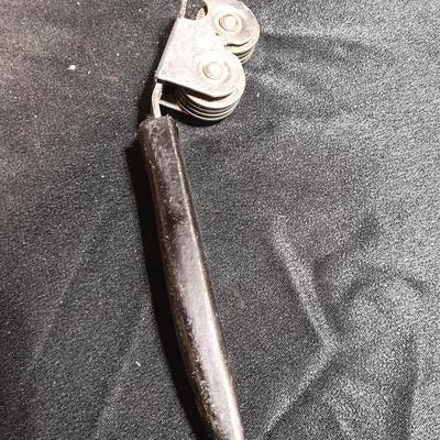 Vintage Climax counter mount grinder, kitchen cooking utensils, and knives