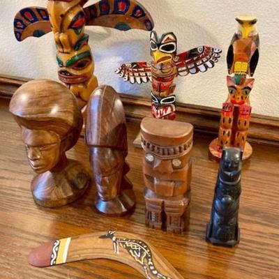 Lot Of Eight Totem Poles, Carved Wood Figures, Decorative Boomerang And Carved Stone