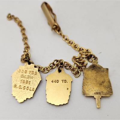 Lot #144  Three Vintage St. Aloysius Award Fobs