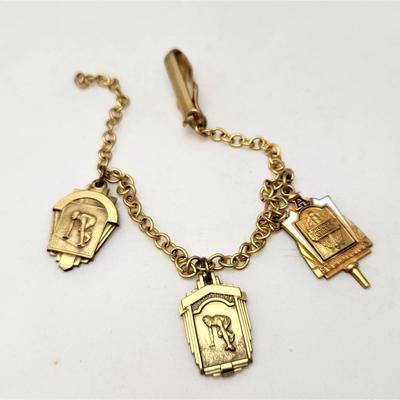 Lot #144  Three Vintage St. Aloysius Award Fobs
