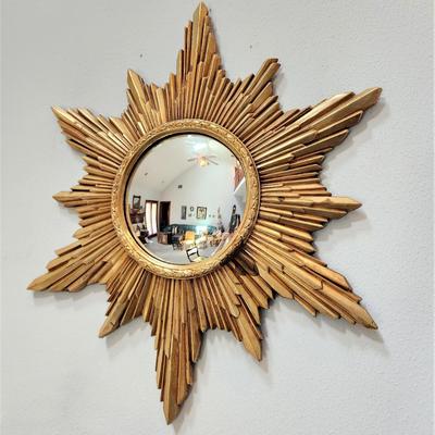 Lot #149  Decorative Bull's Eye Mirror