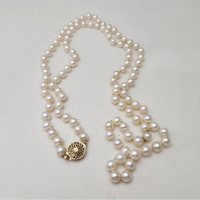 Lot #154  Lovely Strand of cultured pearls with 14kt gold clasp
