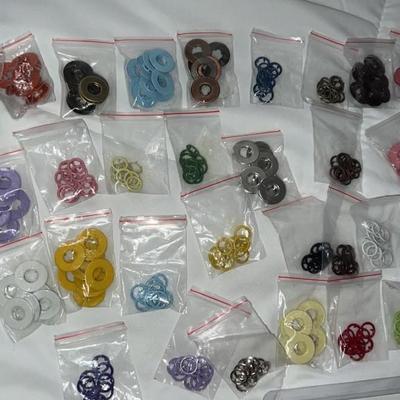 lot of eyelets and gromlets for arts and craft