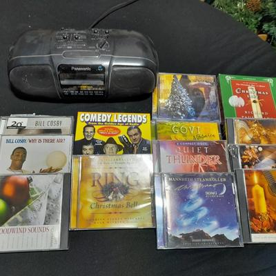 Very nice Panasonic portable Stereo clock radio with several different music choices on Compact Disk CD'S
