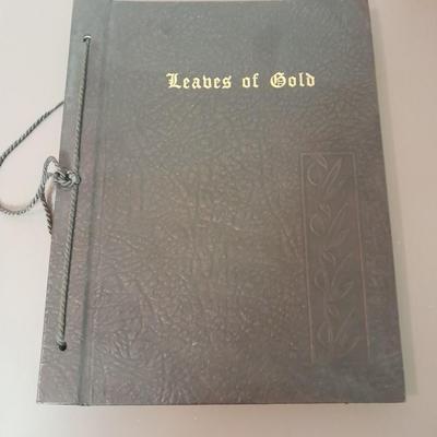 Two religious' books, Leaves of Gold tie bound book and Ideals Scrap book