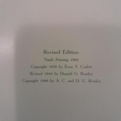 Two religious' books, Leaves of Gold tie bound book and Ideals Scrap book