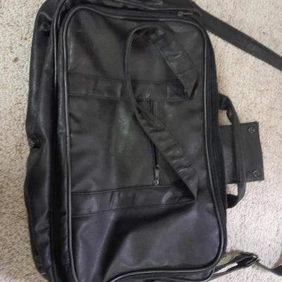 Protool and Luggage, black leather-like case and Samsonite suitcase
