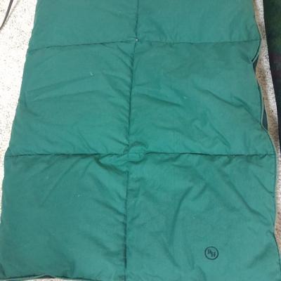 Two throw blankets, one down and a throw Pillow