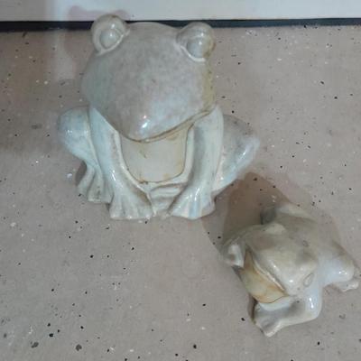 Two glazed ceramic yard frogs
