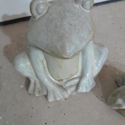Two glazed ceramic yard frogs
