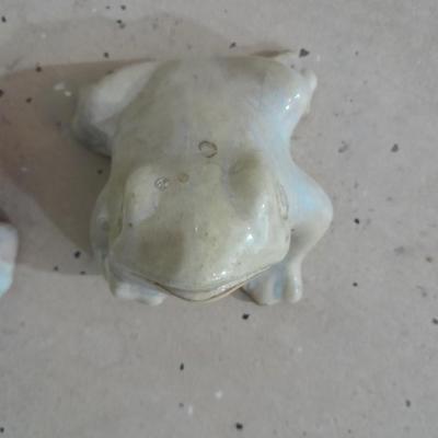 Two glazed ceramic yard frogs