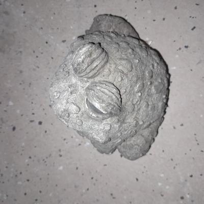 Two small cement garden / pond frogs and a happy toad