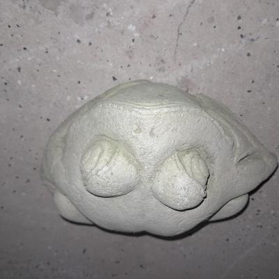 Two small cement garden / pond frogs and a happy toad